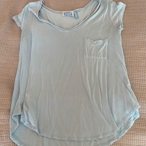 a baby blue t shirt